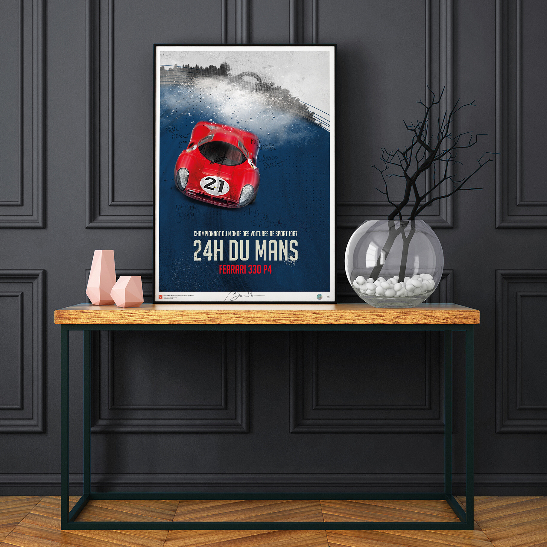 Poster010 Mockup MurNoir - Collector's edition posters of most beautiful historic race cars in the world - 1967 was a banner year for the Enzo Ferrari motor company, as it saw the production of the mid-engined 330 P4, a V12-engined endurance car intended to replace the previous year's 330 P3. Only four Ferrari P4-engined cars were ever made: three new 330 P4s and one ex P3 chassis (0846). Their three-valve cylinder head was modeled after those of Italian Grand Prix-winning Formula One cars. To this was added the same fuel injection system from the P3 for an output of up to 450 hp (335 kW). The P3 won the 1000 km Monza in 1966, and the P4 won the same race in 1967. Two P4s, and one 412 P crossed the finish line together (in first 0846, second 0856, and third place 0844) in the 1967 24 Hours of Daytona, for a photo finish to counter Ford's photo of the Ford GT40 Mk.II crossing the finish line together First, Second, and Third at the 1966 24 Hours of Le Mans. Since then, the fate of these four cars has been the subject of much attention. History : See wikipedia article All orders of minimum 100 € are FREE DELIVERED ALL AROUND THE WORLD